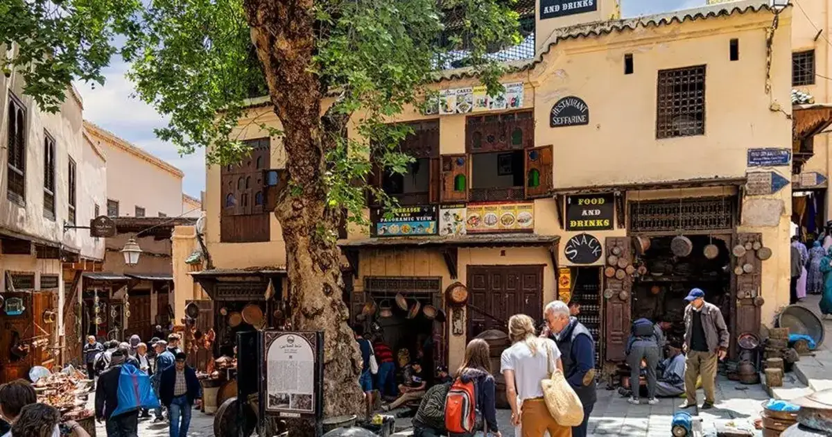 Traditional medina streets in Morocco showing pedestrian walkways and local transport